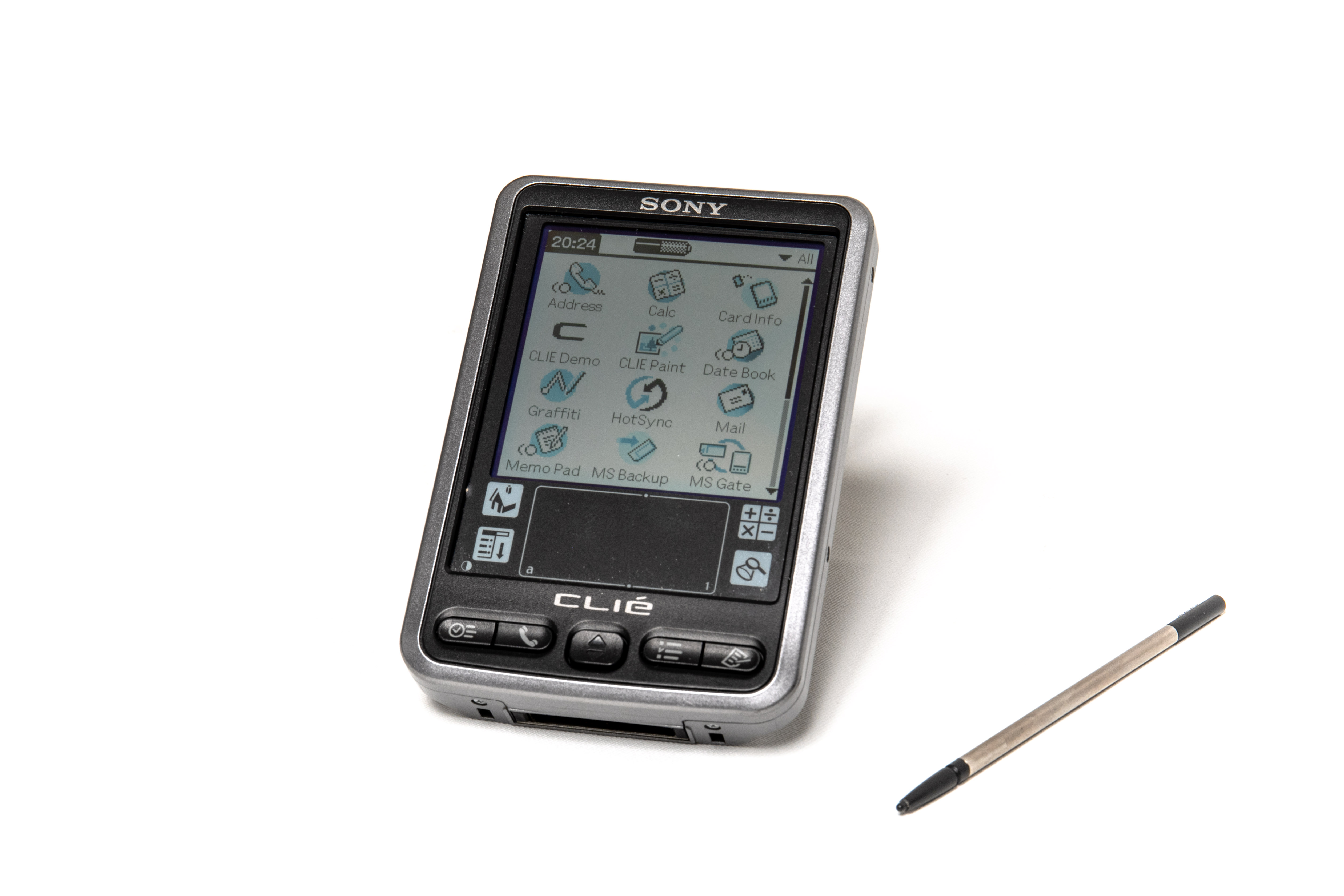 a silver and black PDA with a color screen